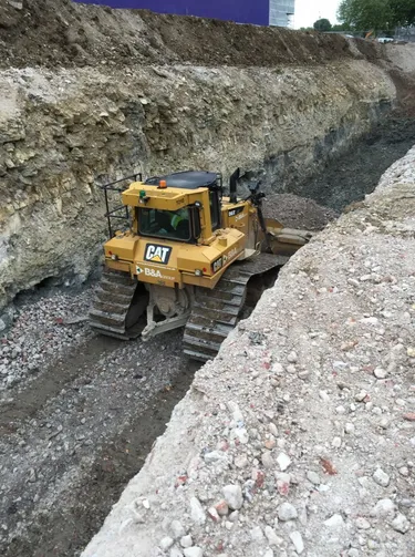 Bulldozer in a trench