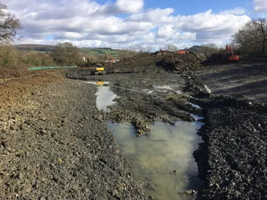 machine working on wet soil