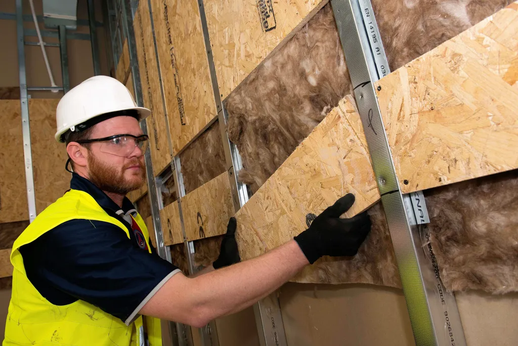 Man wearing hi vis jacket and hard hat