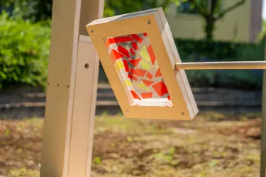 Turning logo in glass sculpture in situ at Vitalis Brunswijk
