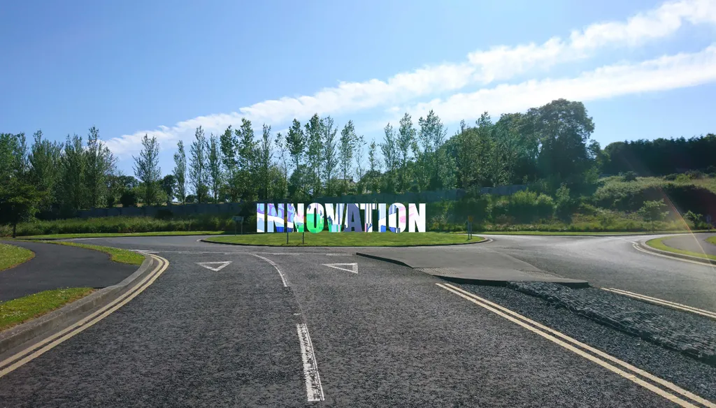 Road with Innovation sign on a roundabout