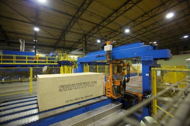 OSB on a roller in a factory